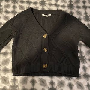 black sweater with buttons